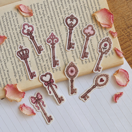 coquette key sticker set 9 vintage skeleton key stickers with heart bow crown rose star and mirror pink brown romantic ephemera on old book with rose petals